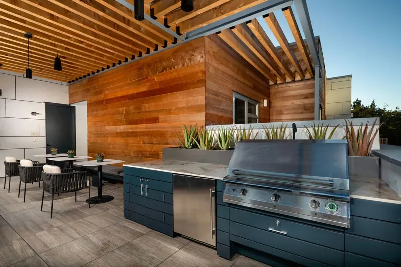 Grilling Station with an outdoor seating area