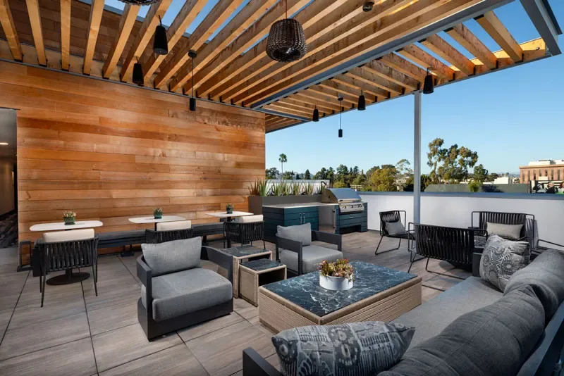 Multiple outdoor lounging areas throughout the community